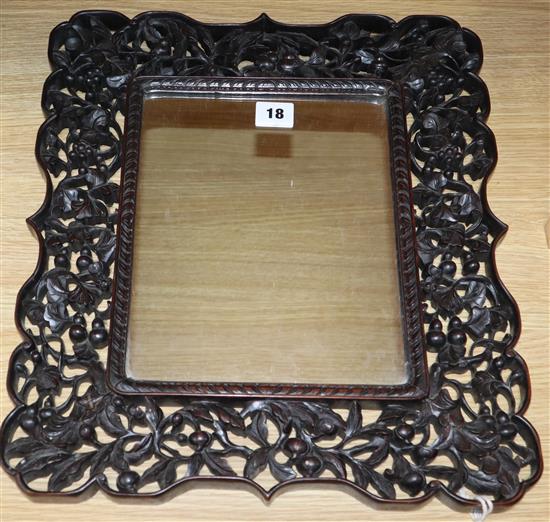 A Chinese hongmu framed mirror, c.1900 overall length 42cm overall width 37cm